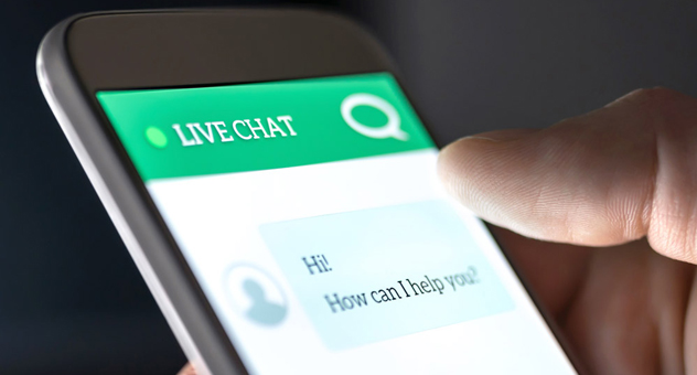 Close-up of someone using live chat on a smartphone.