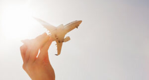 Hand holding plane resize