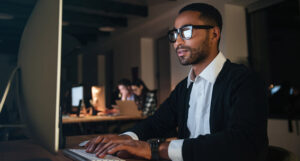 Man concentrating at computer