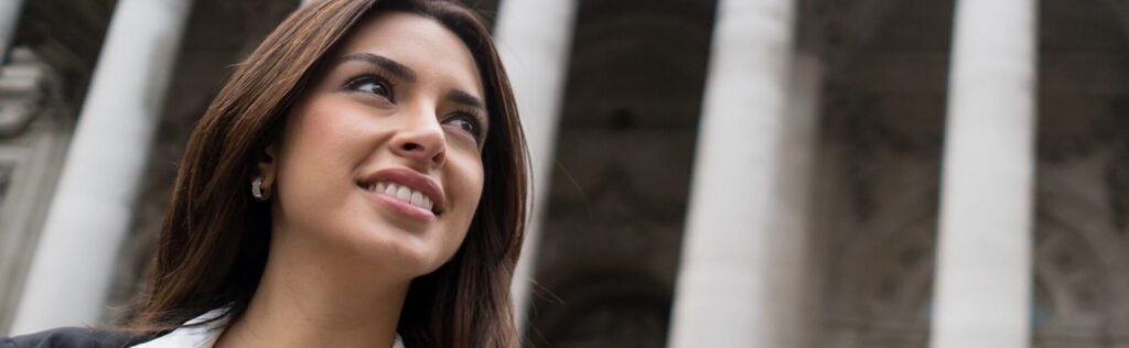 Thoughtful business woman outdoors